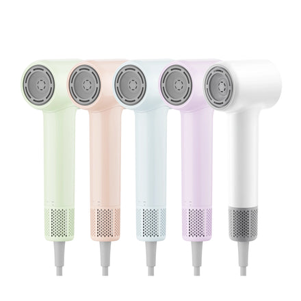 Dreame Mini high-speed hair dryer with accessories on white background